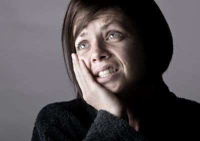 women experiencing mouth pain