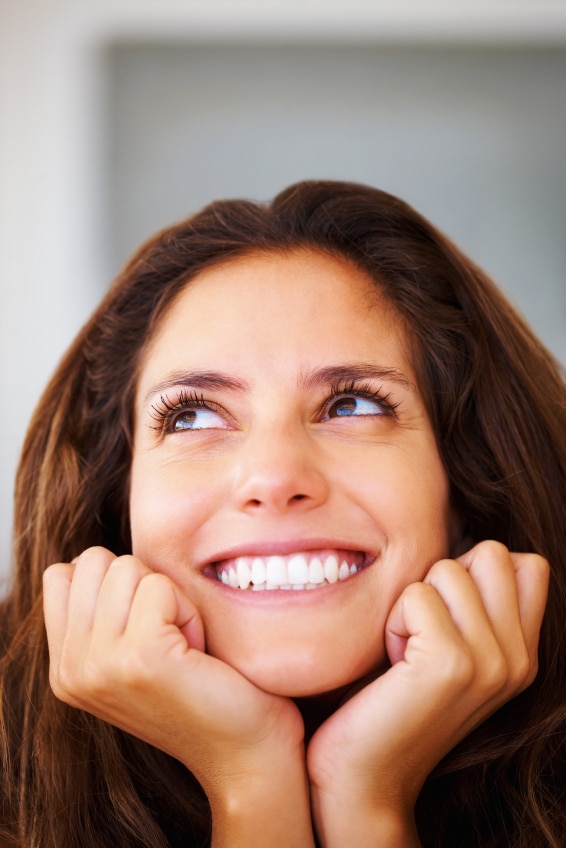 women smiling with dental implants