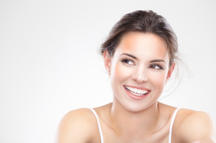 women smiling with dental implants