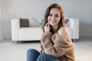 Young smiling beautiful woman at home.